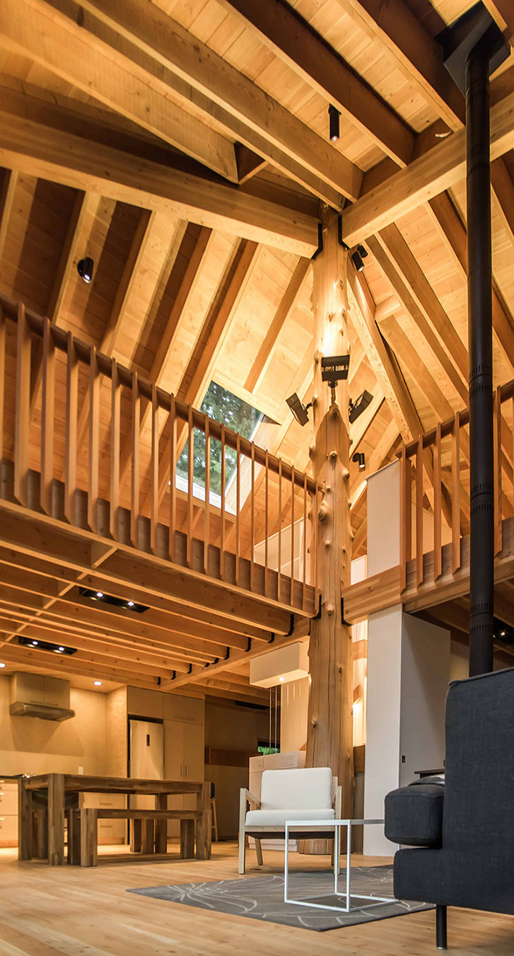 The Interior View Of This Vacation Home Shows Many Wood Beams And A High Ceiling