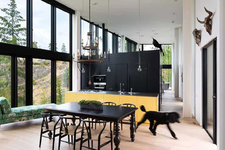 kitchen set against black wall with yellow island
