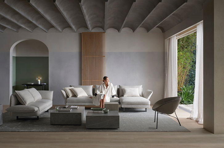 The zaza sofa shown in an open concept living room