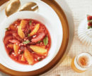 citrus in red sauce on a plate
