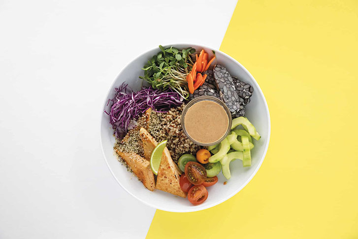 Vegan Plant-based protein bowl on a yellow and white background