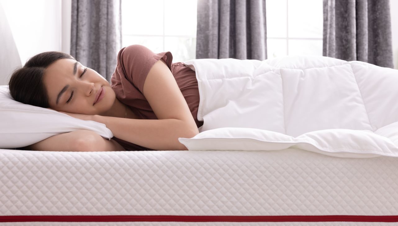 Woman sleeping on a cooling mattress