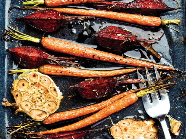 A tray of roasted carrots and garden vegetables