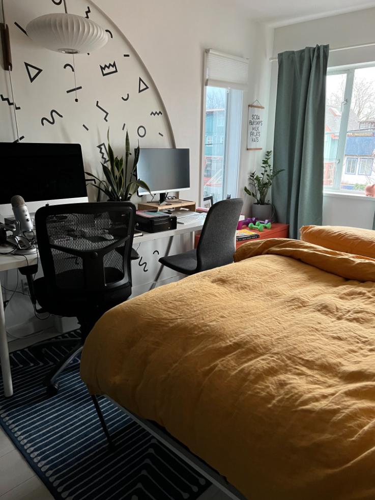 a bed open with a desk next to it