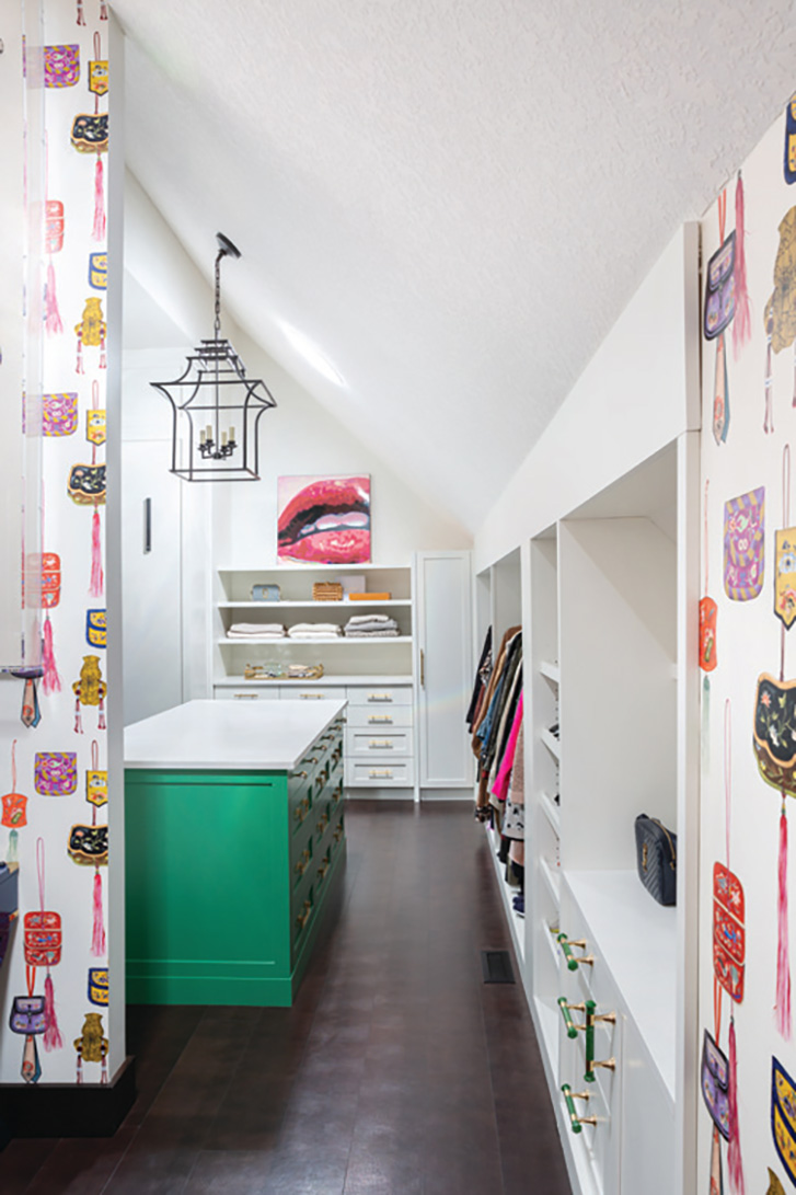 A colourful custom closet in a home from Calgary designer Reena Sotropa. 