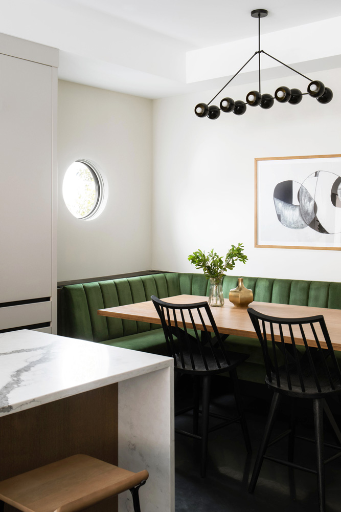 Green bench seating in kitchen