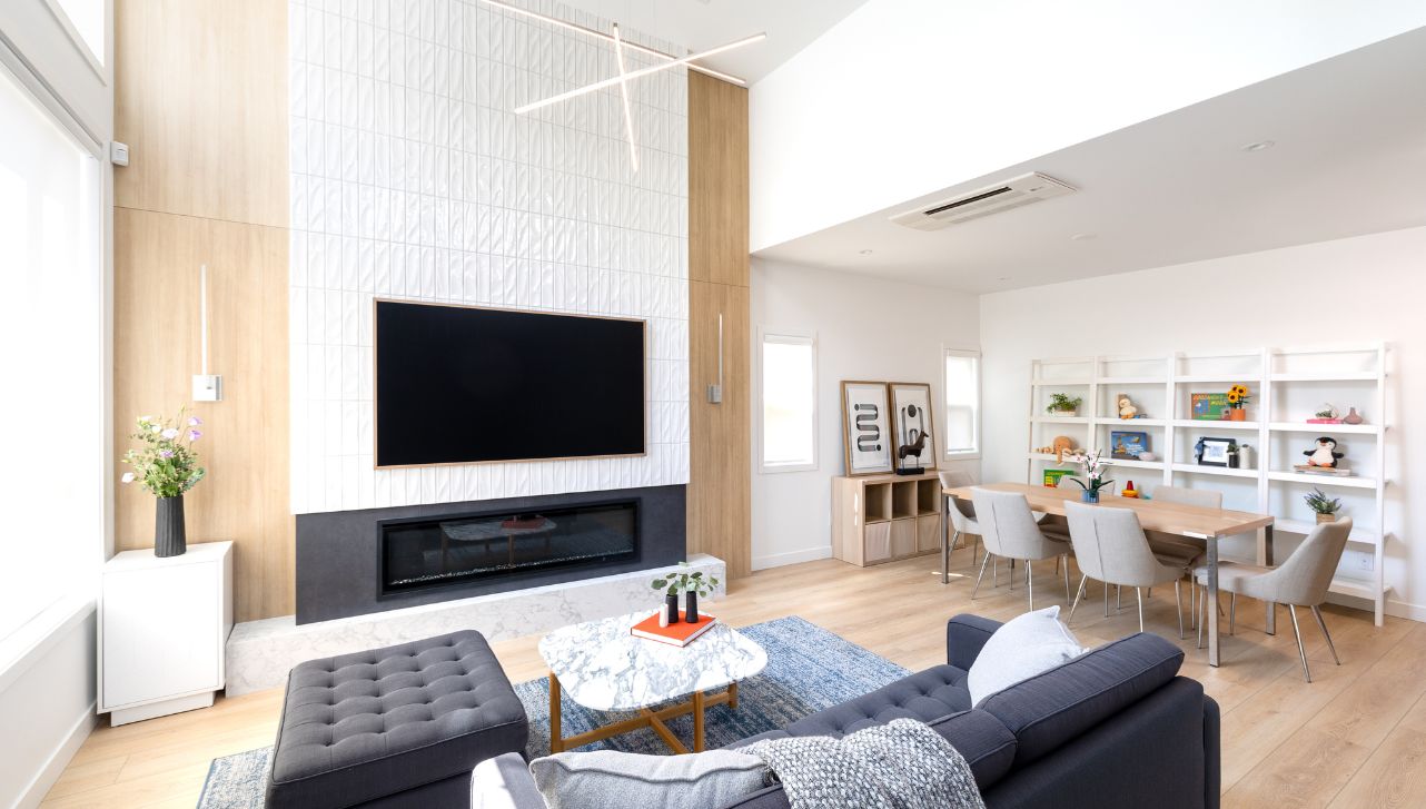 Interior living room with light rod lighting fixture and hardwood floors with white walls, minimalist design