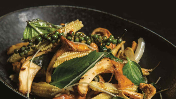 Vegan Recipe: Close up of Stir-Fried Chanterelles and Baby Corn