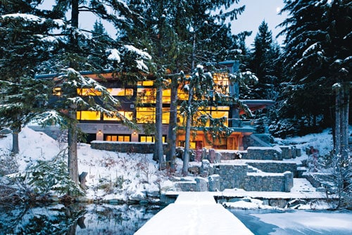 Winter Wonderland | Squamish-quarried brougham stone and charcoal-stained cedar help this modern architecture fit right into its woodland surroundings.