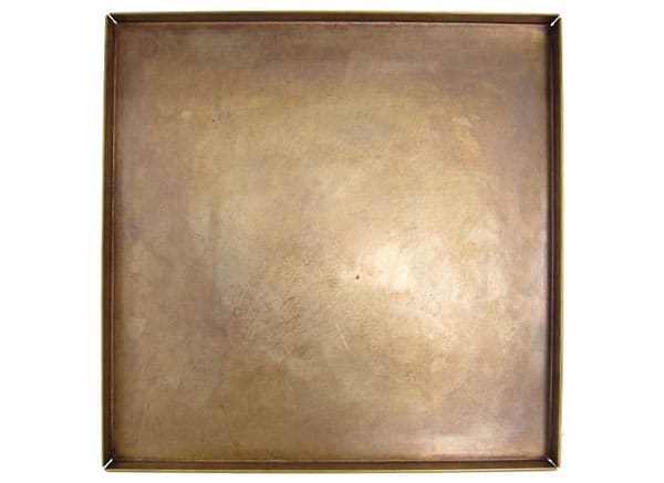 The patina on the Martha Sturdy brass square tray ($260) adds warmth. sturdyliving.com