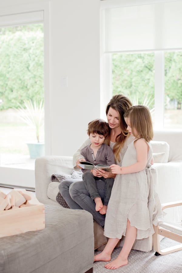 All Together Now | Homeowner Lauren, with her two children Charlie (left) and Eden, enjoys some downtime in her renovated West Vancouver home.