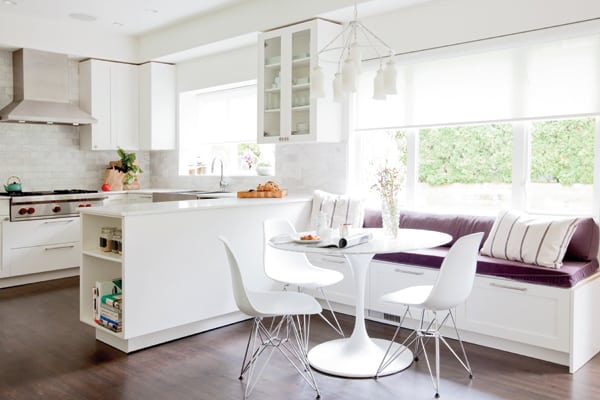 Divine Dining | The new kitchen design loses the island and includes a peninsula instead, creating a more efficient workspace. Everything went whiter and brighter.