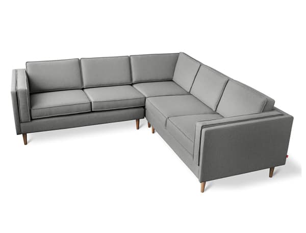 Gus Modern’s low-profile Adelaide bisectional sofa from Stylegarage pairs a sleek form with a warm grey fabric.