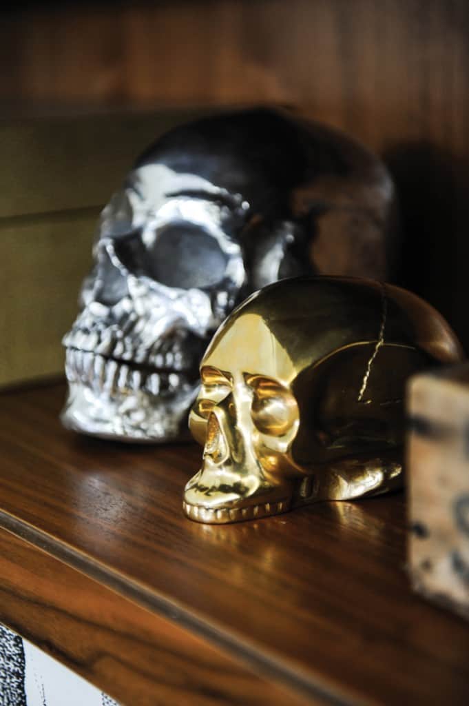 Metallic skull sculptures from The Cross.