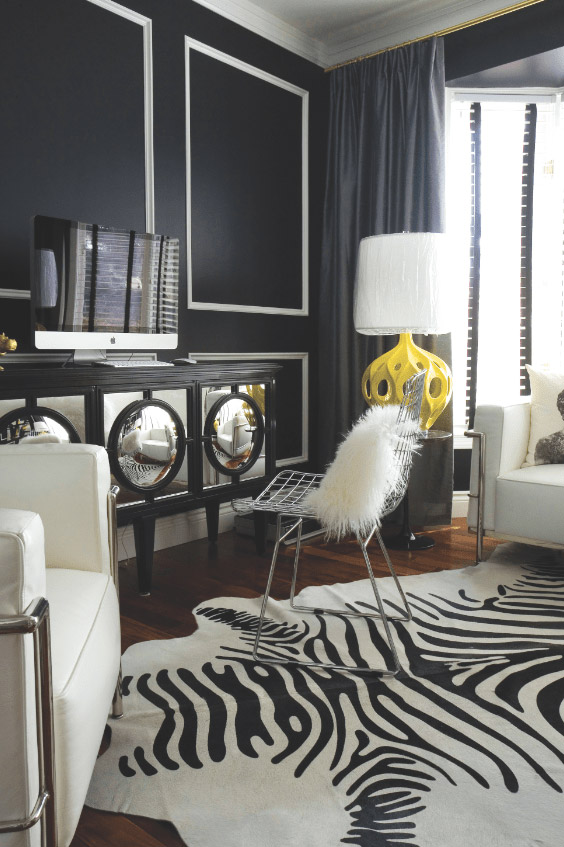 OFFICE: The zebra rug in the comfy office—painted in rich black paint from Benjamin Moore—is actually a cowhide, stamped with a funky print.  
