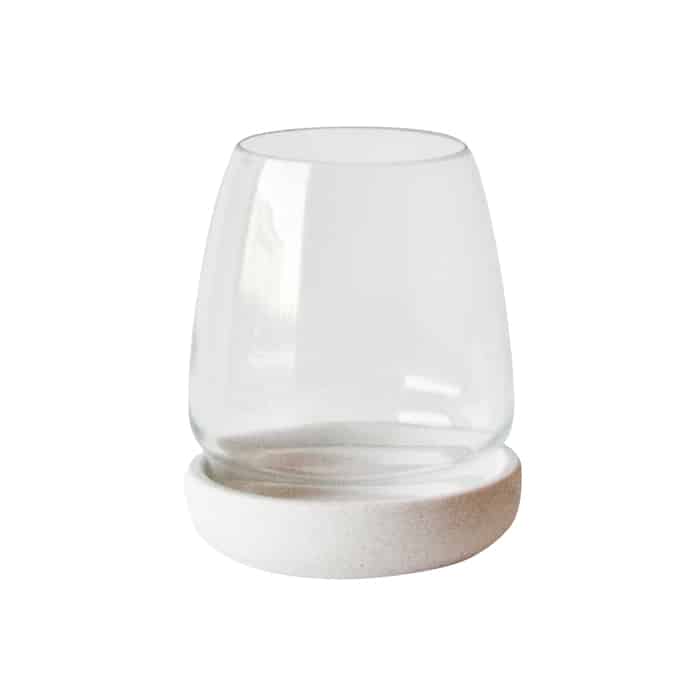 These Sand Hurricane votives (from $12) look best in pairs or clusters. 18karatstore.com 