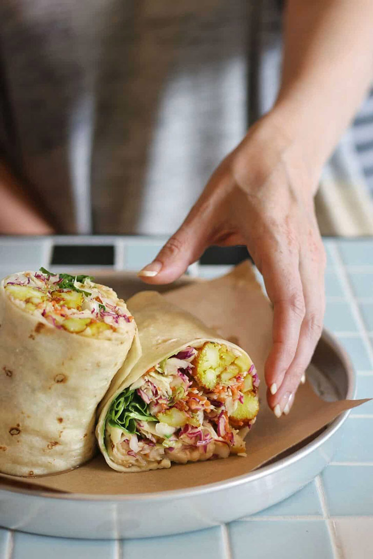 Quick, affordable, and unbelievably tasty, a burrito done well is the perfect casual meal. Tacofino's new wraps such as this mouthwatering (vegetarian!) Cauliflower Burrito turn the Vancouver burrito game on it's head.