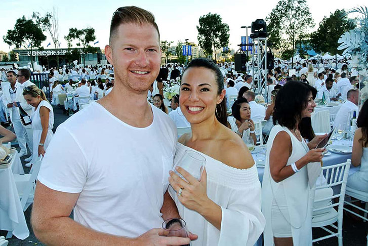 Dressed in head-to-white Mark Starkey, Managing Partner, Victory Interactive Agency, and his wife Whitney, attend their first Diner en Blanc.