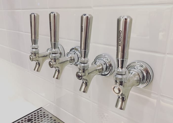 Going to the bar becomes part of your morning routine at Dalina: milk (including soy and almond), cream and water are dispensed from these sleek taps.