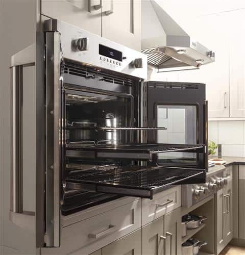 French doors and pull-out racks make an oven more accessible by eliminating users' need to reach across a large oven door.