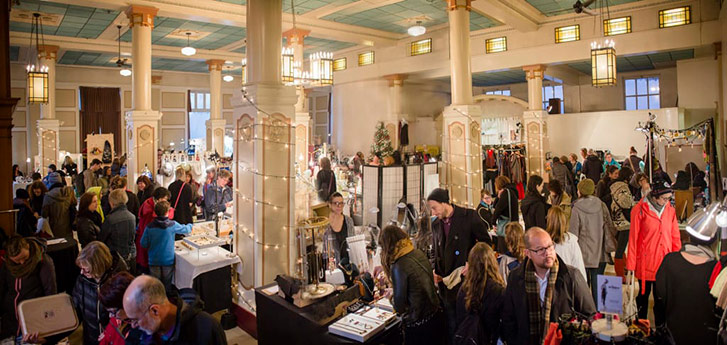 Shoppers at the Shiny Fuzzy Muddy Art Show in Heritage Hall.